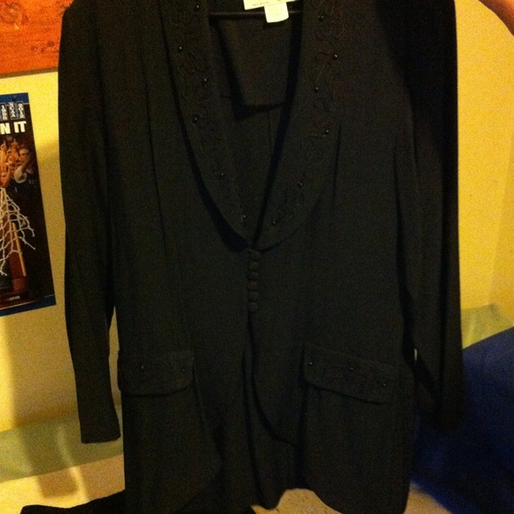 Black jacket with black slacks