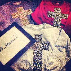 Red leopard cross sweatshirt.. I have 10 available