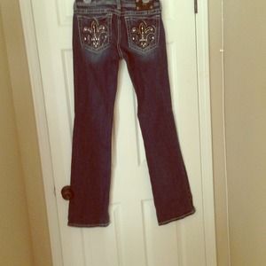 Miss Me Jeans dark distressed boot cut jeans.