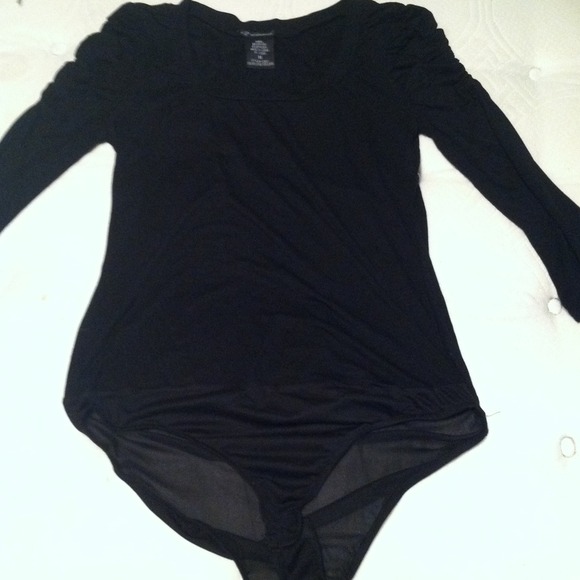 **Reserved**Body suitAll in one black shirt