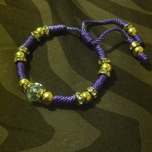Purple bracelet with gold and diamonds