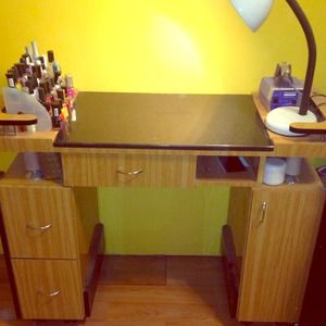 Nail table and supplies. As is.