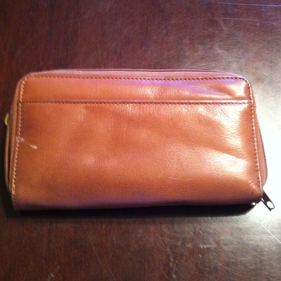 Clutches & Wallets - Genuine leather wallet. Brown color.