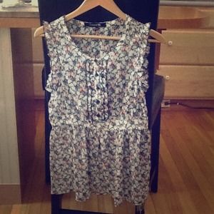 Sheer sleeveless blouse