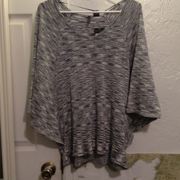 Sparkling gay batwing top.