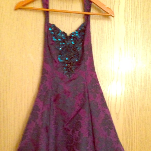 Shoes, boots, dress, designer purse.