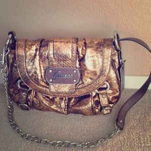 GUESS brand bronze purse. NEW.