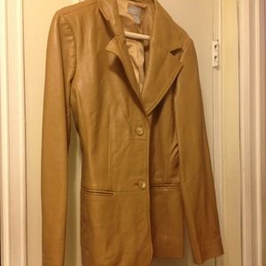 Biege faux leather jacket.