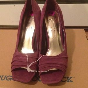 High heeled purple shoes.