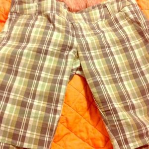 Green plaid shorts (junior clothing)