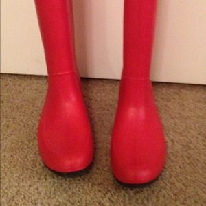 Bright red rain boots.