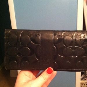 Genuine leather, genuine "Coach" wallet.