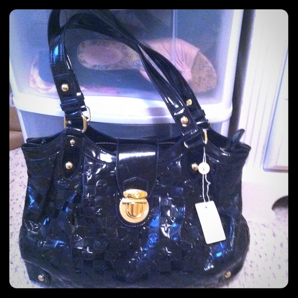 Louis Vuitton black tote **Practically NEW!!!**