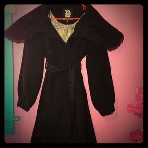 Bold black Dollhouse coat