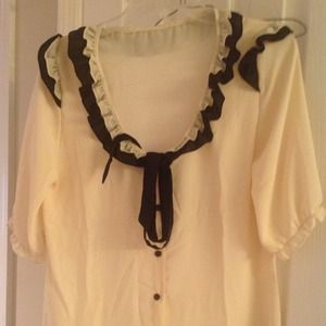 Sheer blouse super cute with 3/4 sleeves. Sheer blouse super cute with 3/4 sleeves.