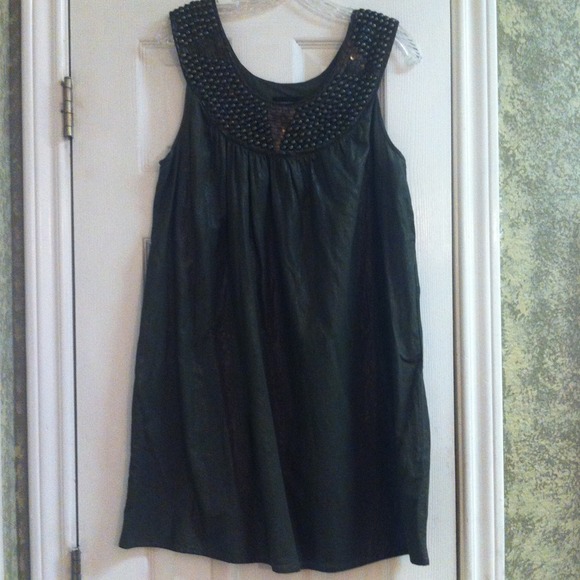 Worn once, very small bleached area not noticeable