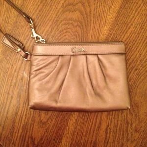 Coach bronze wristlet