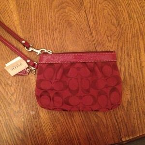 Coach wristlet reserved @dukefanjenny