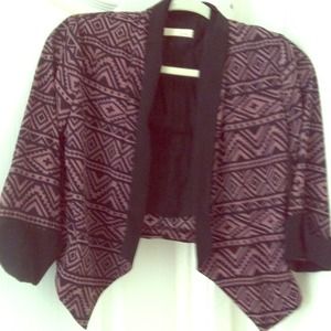 Cropped Aztec print blazer.