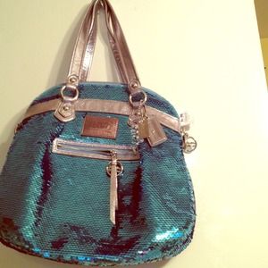 Real !! Poppy coach binged purse.