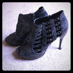 Heel caged booties