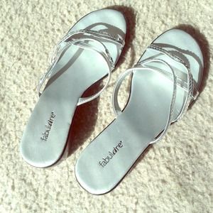 A pair of silver shoes