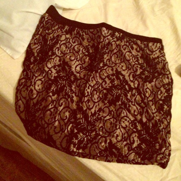 Golden lace mini skirt