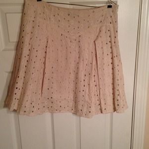 Limited Eyelet skirt with pleats.