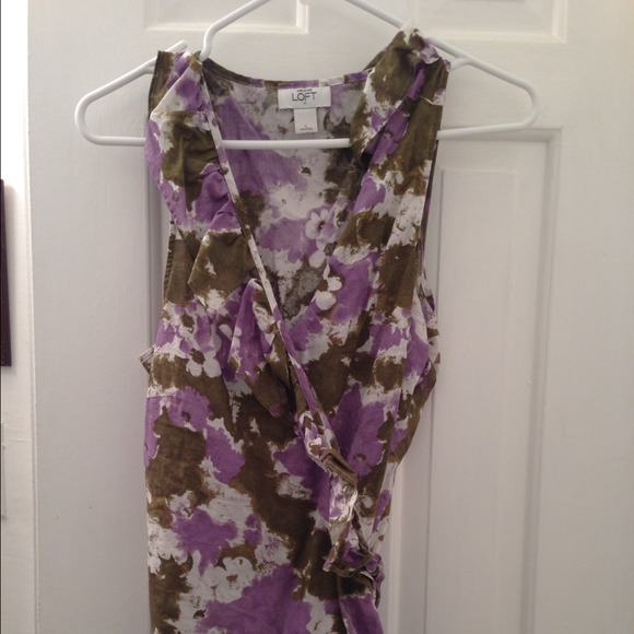 Cute ATL sleeveless ruffle wrap top