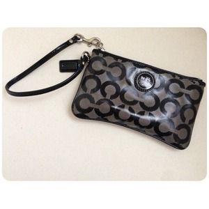 Black and grey Coach wristlet.