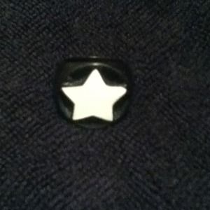Black ring with white star