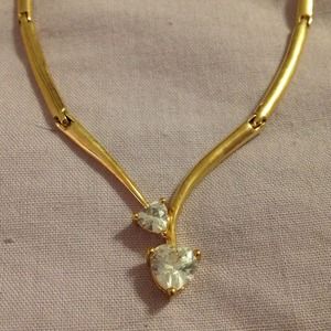 Goldtone necklace with triangle stones