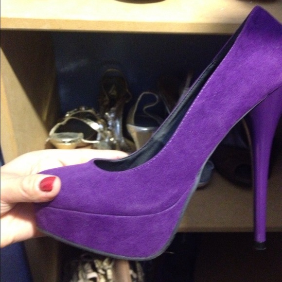 Purple suede pumps