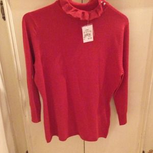 Burnt orange colored sweater