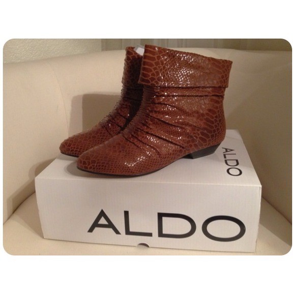 Snake skin ankle boots by ALDO.