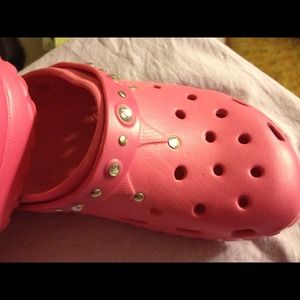 Bright pink slip on sandals