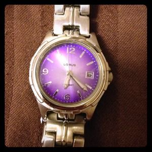 Cute watch with purple face and BKE necklace.