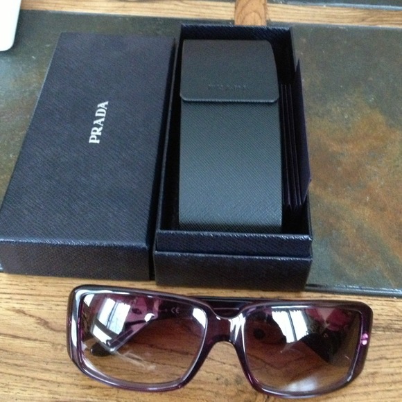 Authentic Prada sunglasses with box and case.