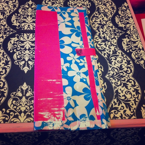 A duck tape coupon organizer or check book holder!