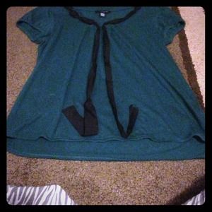 Dark Blue-green tee shirt.
