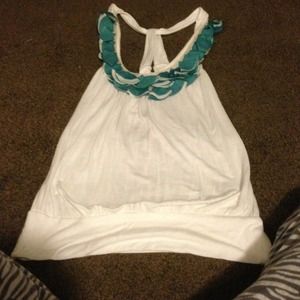 White ruffled tank.