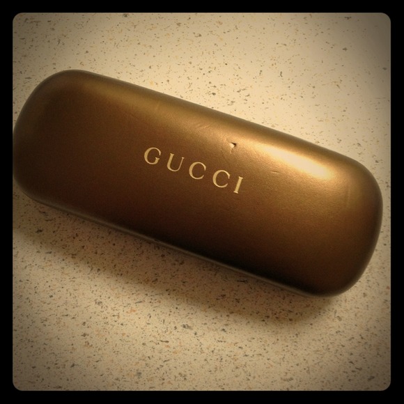 Gucci glass case.