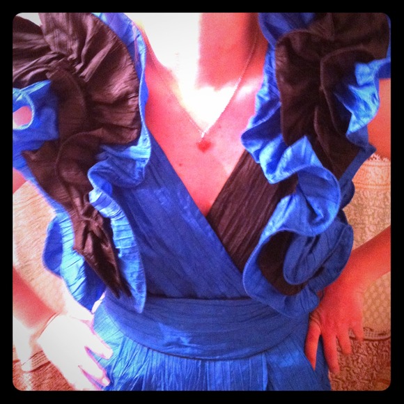 Black and blue 80s jumpsuit.