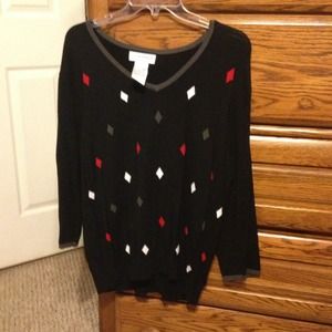 Black sweater and diamond pattern