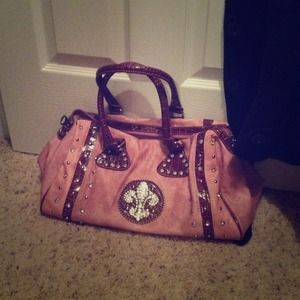 Purple -maroon ish purse.