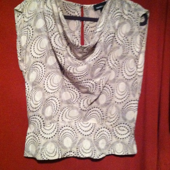 Blouse back is cut out for a sexy peek. Silky - Picture 3 of 3