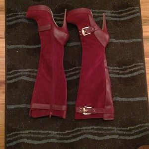 Red boots with gold buckles