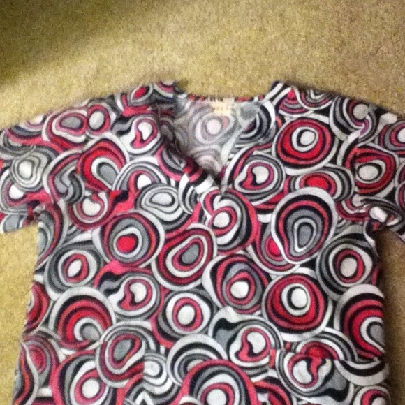 Scrub top and gray pants