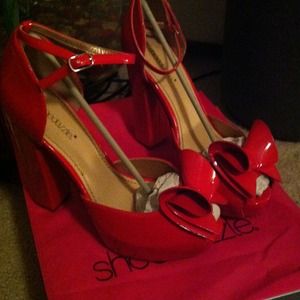 Never worn 4 inch Red peep toe chunky heels