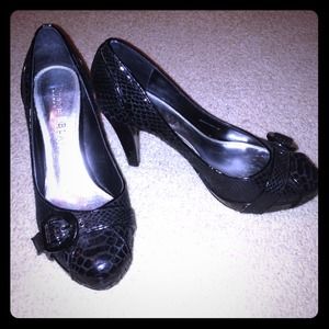 Black patent leather snake skin platform heels